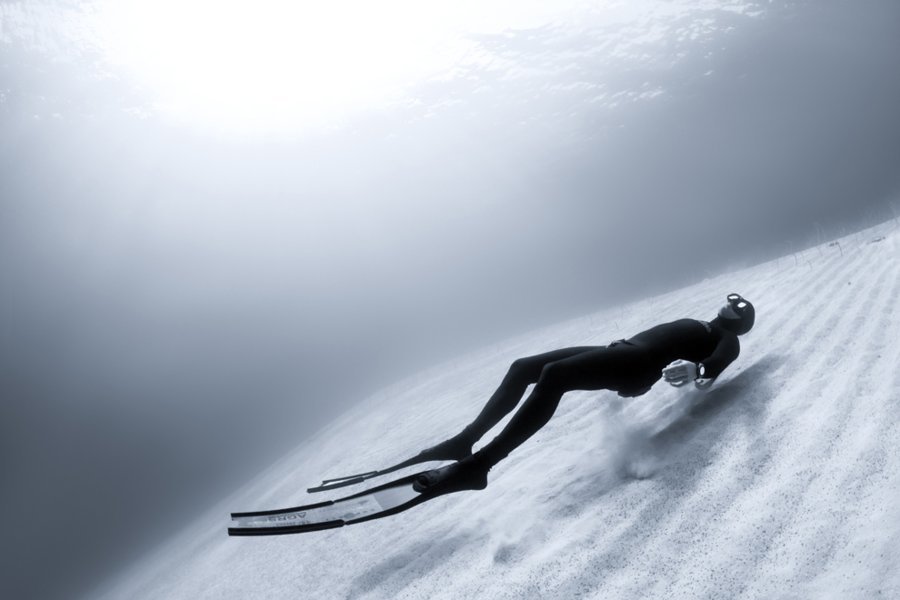 SUNBATHING UNDERWATER: The sun gives us energy even underwater. This image was captured during freediving (diving on a single breath without scuba gear) in the Red Sea. Eel Garden, Dahab, Sinai, Egypt