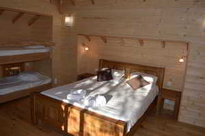 Chambre du chateau dans les arbres - ÉcOtelia, domaine éco-responsable au coeur des Landes de Gascogne
